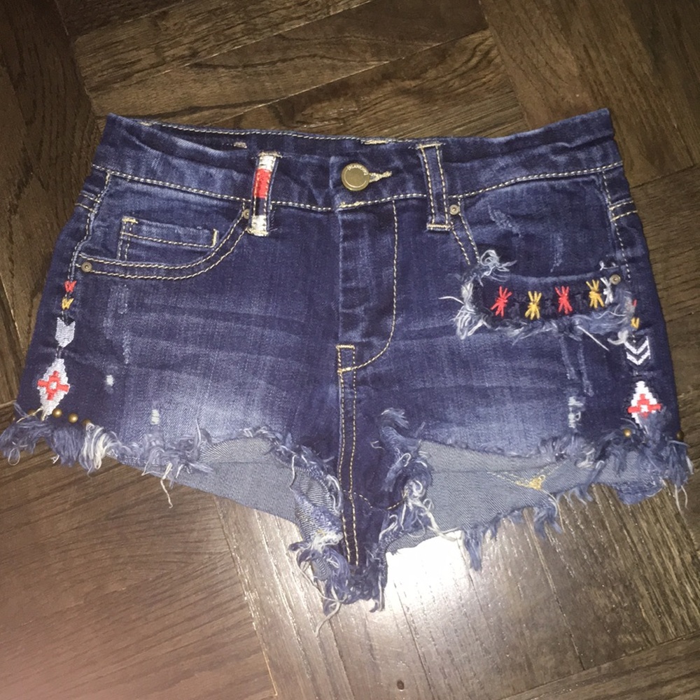 Embroidered cutoff jean shorts